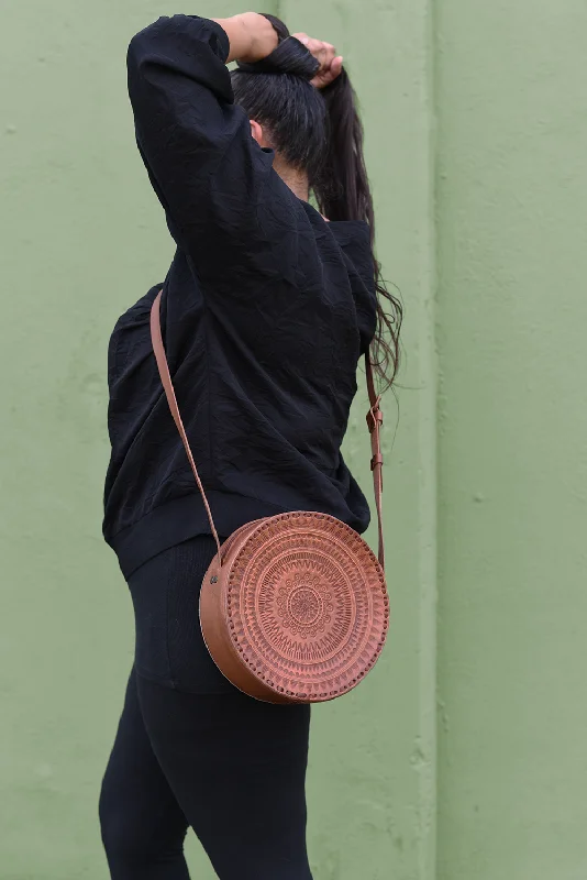 Embossed Circle Crossbody